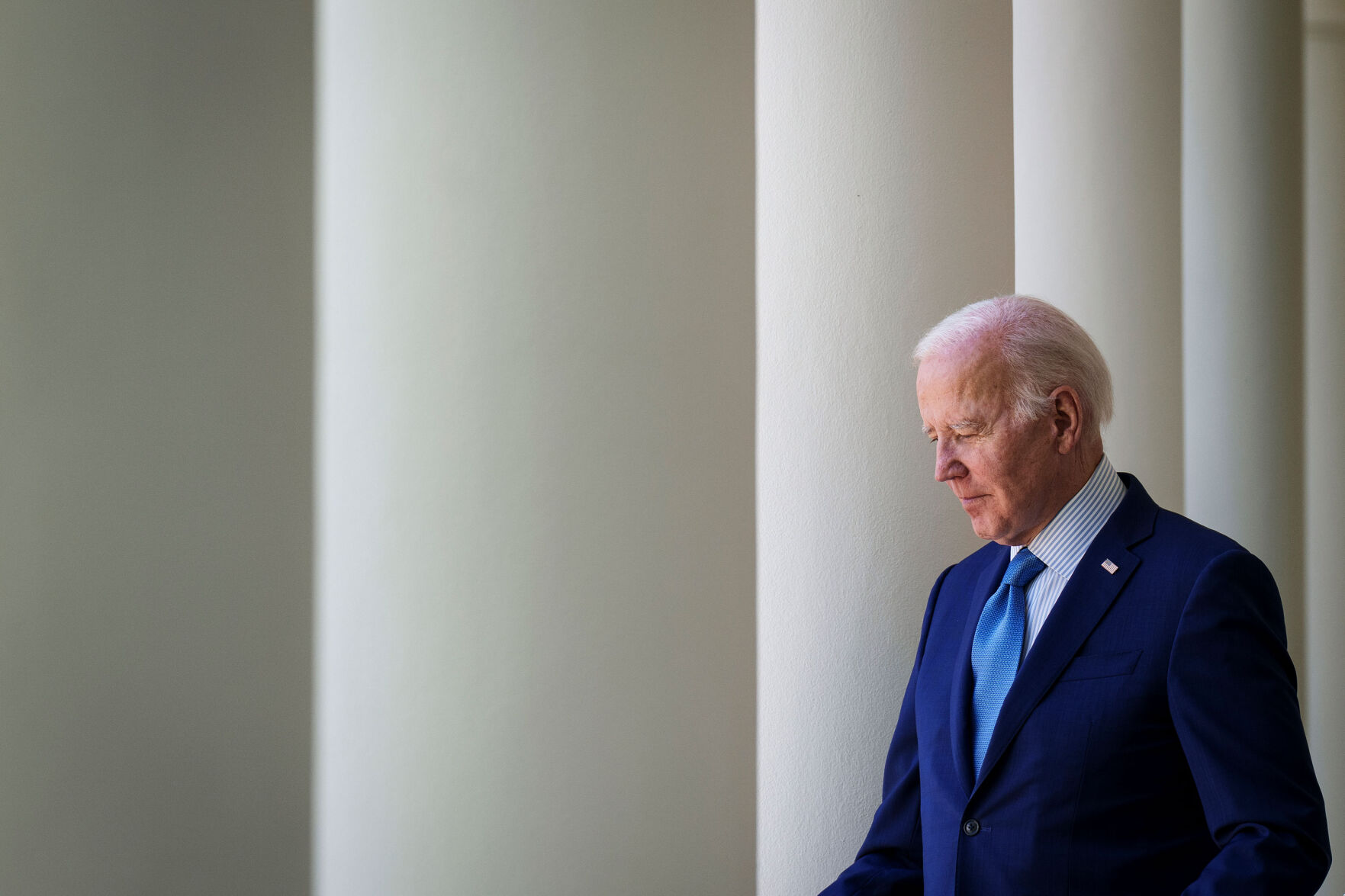 Joe Biden enters Rose Garden